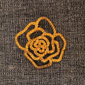 Orange rhinestone flower brooch